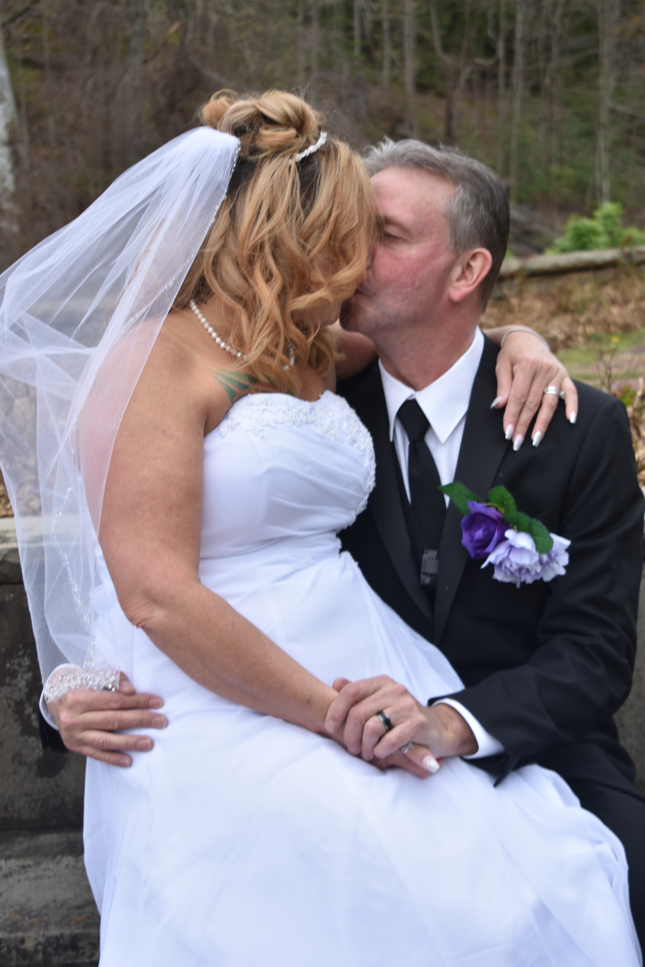 Bride and groom outdoor wedding portrait
